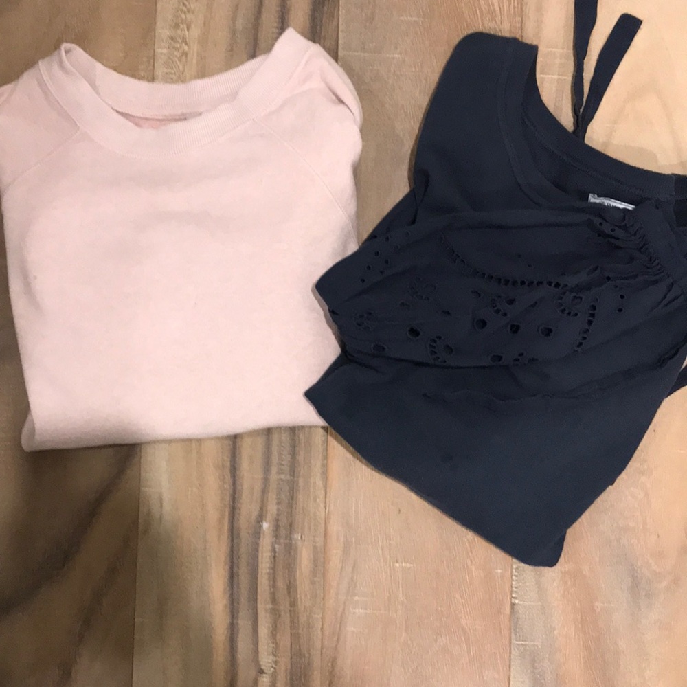 Light pink and navy sweatshirts